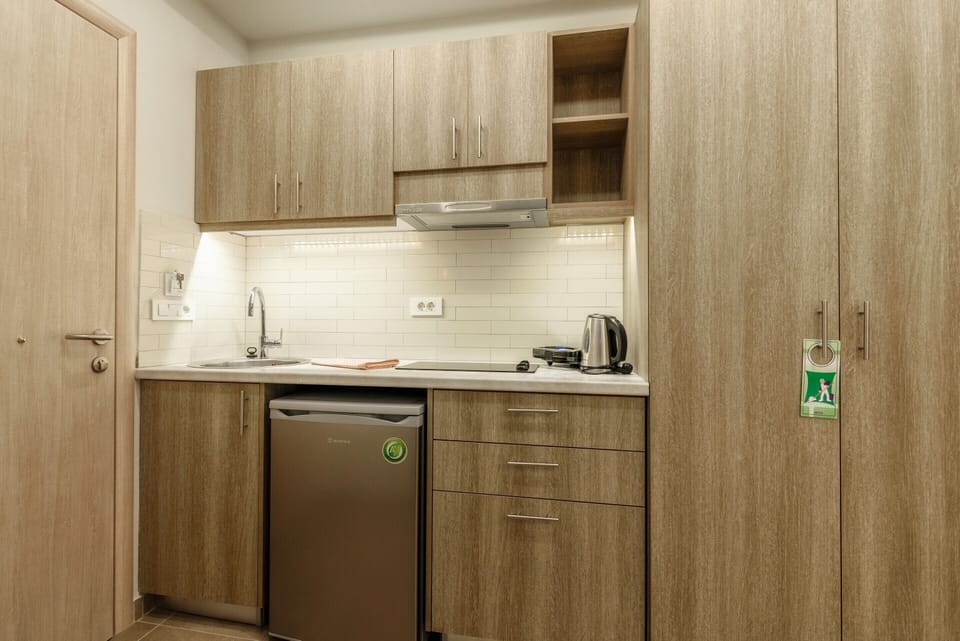 Fridge, stovetop, electric kettle, toaster