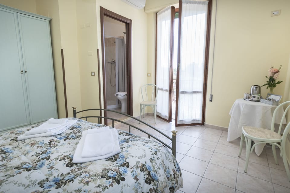 Double Room, Patio, Garden View | Individually furnished, desk, soundproofing, iron/ironing board
