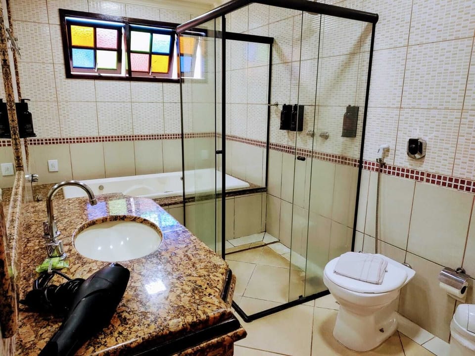 Grand Room, 1 Bedroom, Jetted Tub | Hypo-allergenic bedding, blackout drapes, free WiFi, bed sheets