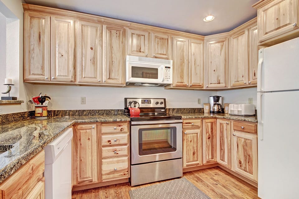 Condo, 2 Bedrooms | Private kitchen | Full-size fridge, microwave, oven, stovetop
