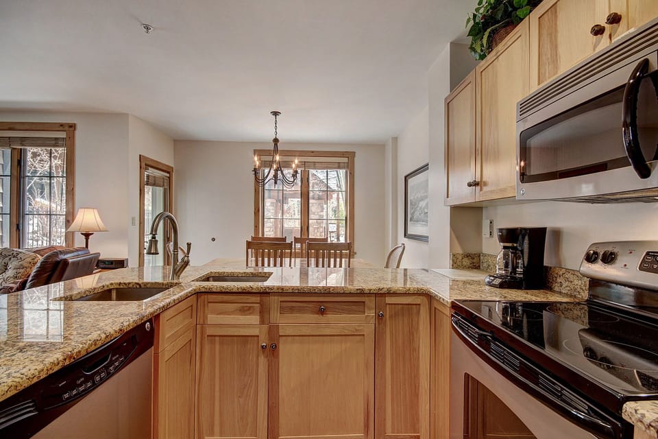 Condo, 2 Bedrooms | Private kitchen | Full-size fridge, microwave, oven, stovetop