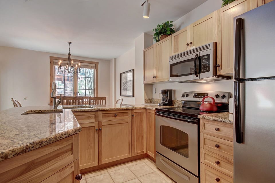 Condo, 2 Bedrooms | Private kitchen | Full-size fridge, microwave, oven, stovetop