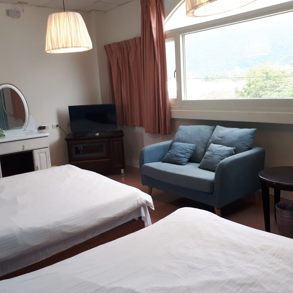 Standard Quadruple Room | Desk, blackout drapes, free WiFi, bed sheets