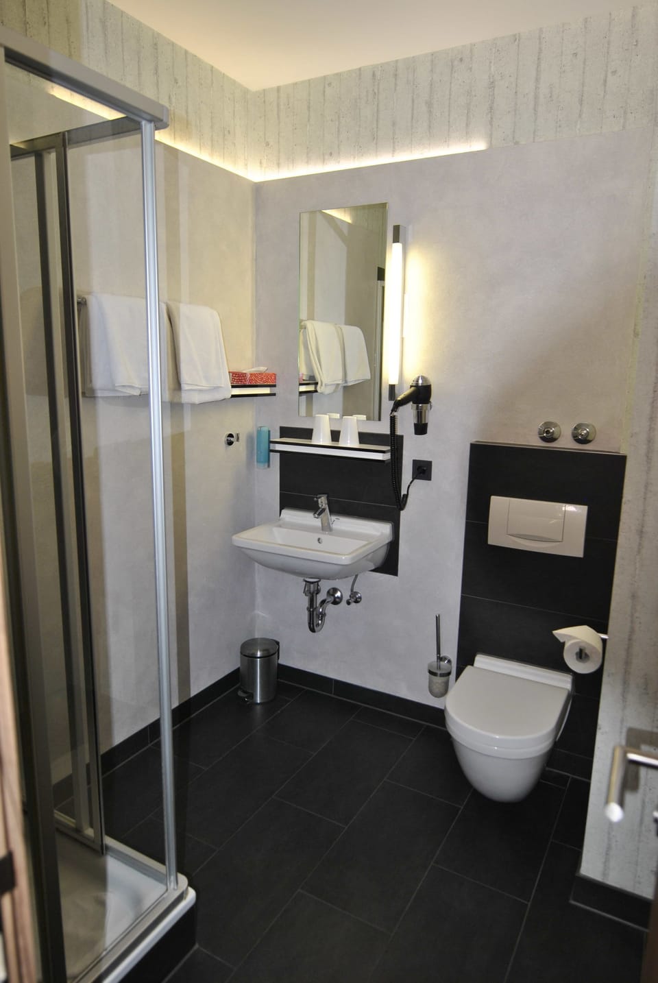 Shower, free toiletries, hair dryer, towels