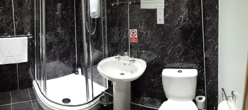 Shower, free toiletries, hair dryer, towels