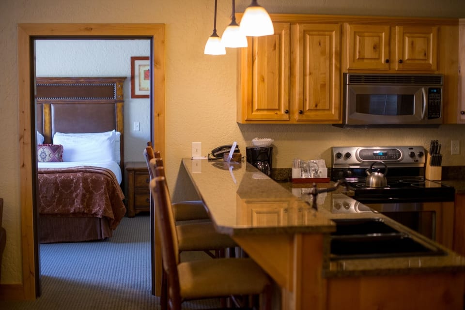 Condo, 2 Bedrooms | Private kitchen | Coffee/tea maker, full-size fridge, microwave, oven