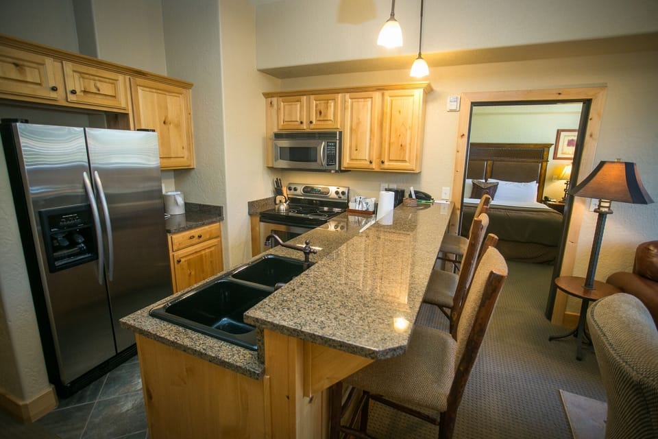 Condo, 1 Bedroom | Private kitchen | Full-size fridge, microwave, oven, stovetop