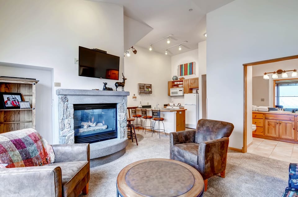 Condo, 1 Bedroom | Living area | Flat-screen TV, fireplace, DVD player