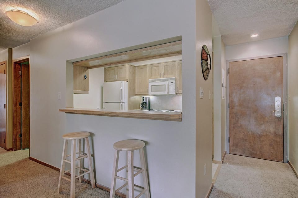 Condo, 2 Bedrooms | Private kitchen | Fridge, microwave, oven, stovetop