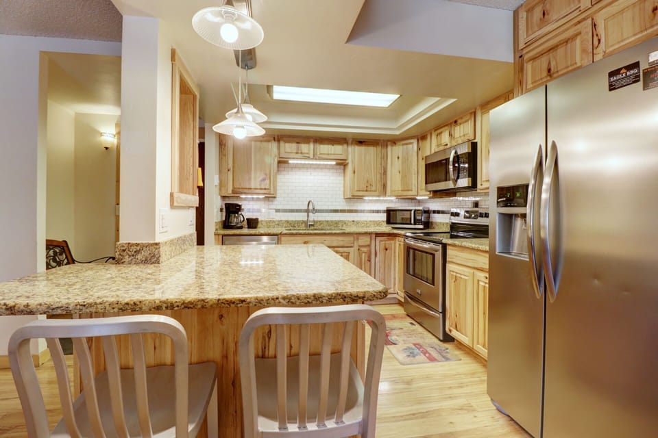Condo, 1 Bedroom | Private kitchen | Full-size fridge, microwave, oven, stovetop