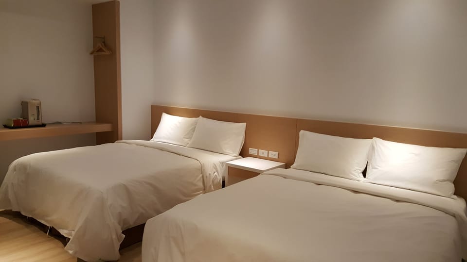 Family Quadruple Room | Down comforters, pillowtop beds, desk, blackout drapes