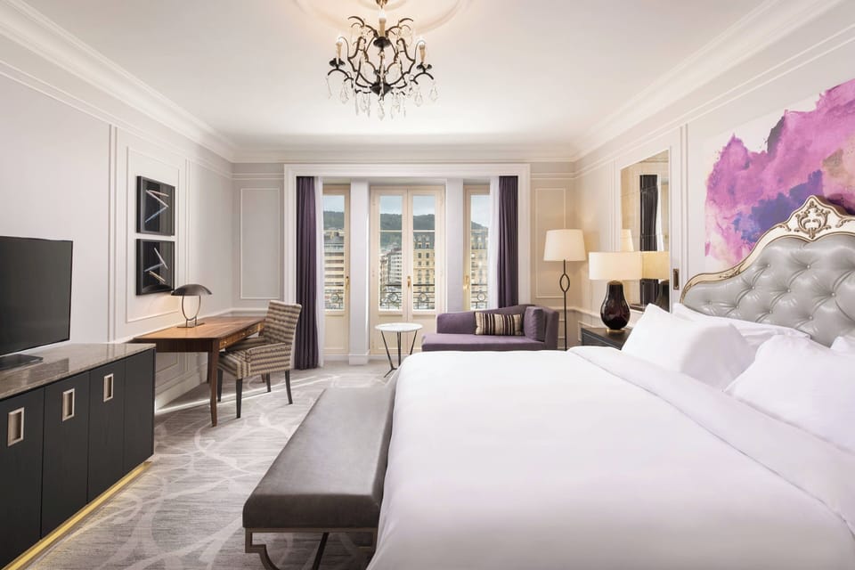 Premium bedding, down comforters, pillowtop beds, minibar