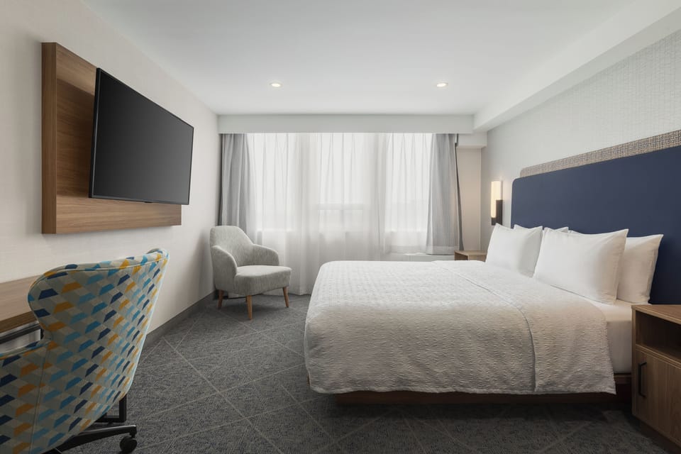 Room, 1 King Bed (Microwave/Fridge) | Premium bedding, pillowtop beds, desk, blackout drapes