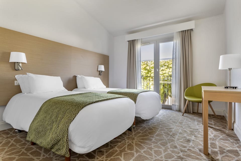 Apartment, 2 Bedrooms | In-room safe, soundproofing, iron/ironing board, free cribs/infant beds