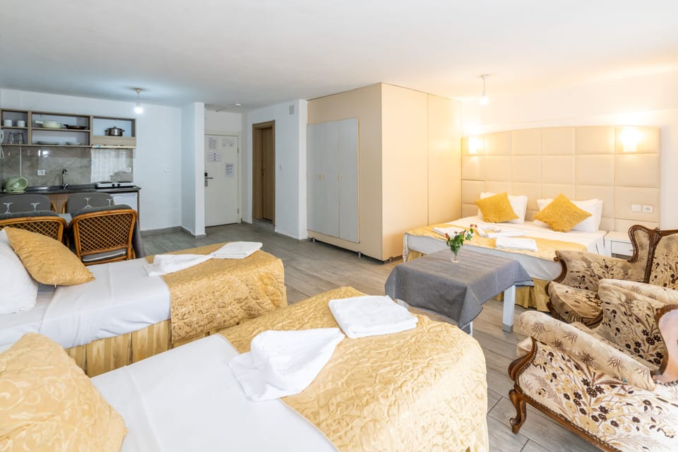Economy Studio, 1 Bedroom | Living area | 82-inch LCD TV with satellite channels, TV