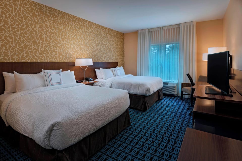 In-room safe, desk, iron/ironing board, free cribs/infant beds