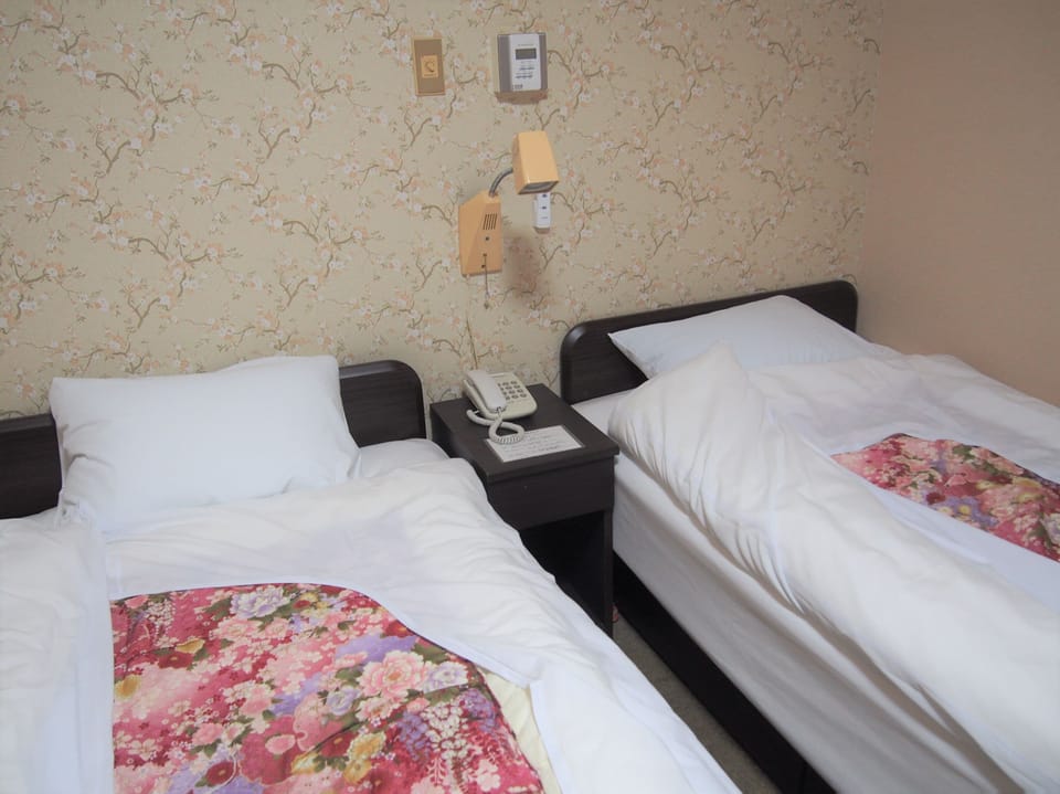 Twin Room with 2 Japanese Size Single Beds, Non Smoking | In-room safe, desk, blackout drapes, iron/ironing board