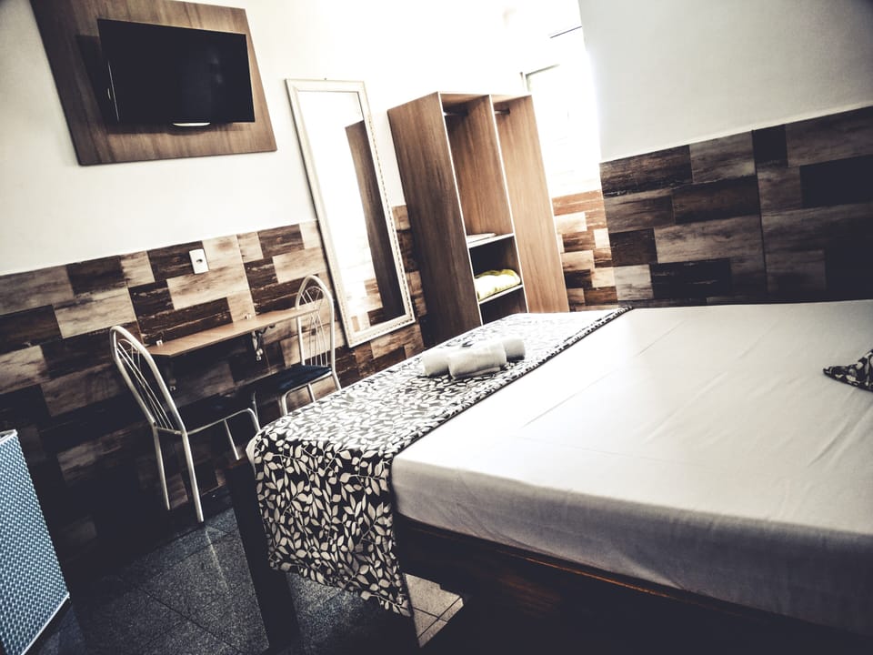 Double Room | Minibar, desk, iron/ironing board, free cribs/infant beds