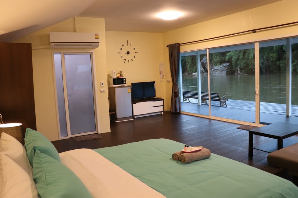 The Ozone Riverside Room | Premium bedding, free minibar, individually decorated, blackout drapes