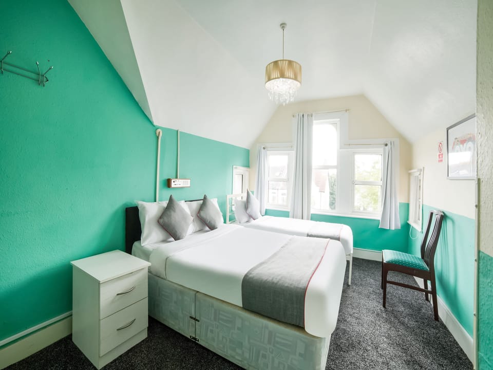 Deluxe Triple Room | Hypo-allergenic bedding, in-room safe, iron/ironing board, free WiFi