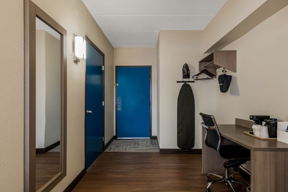 Premium Room, 1 King Bed, Partial Ocean View (Roll-In-Shower, Smoke Free) | Desk, laptop workspace, blackout drapes, iron/ironing board