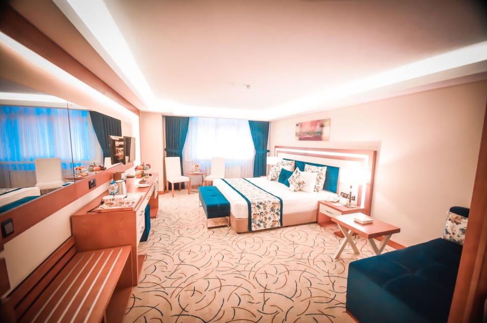 Deluxe Room | Premium bedding, down comforters, minibar, in-room safe