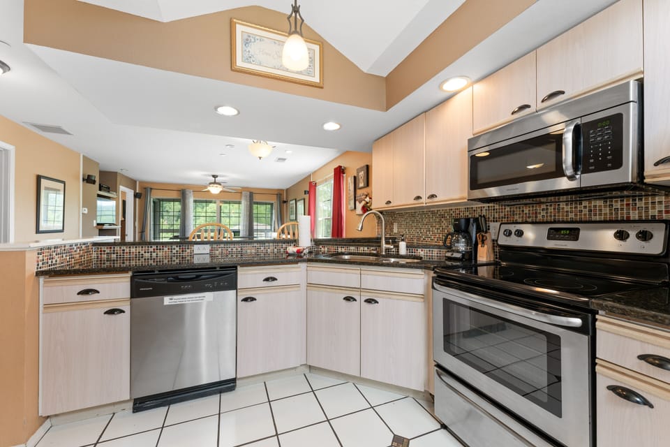 Condo, 2 Bedrooms | Private kitchen | Full-size fridge, microwave, oven, stovetop