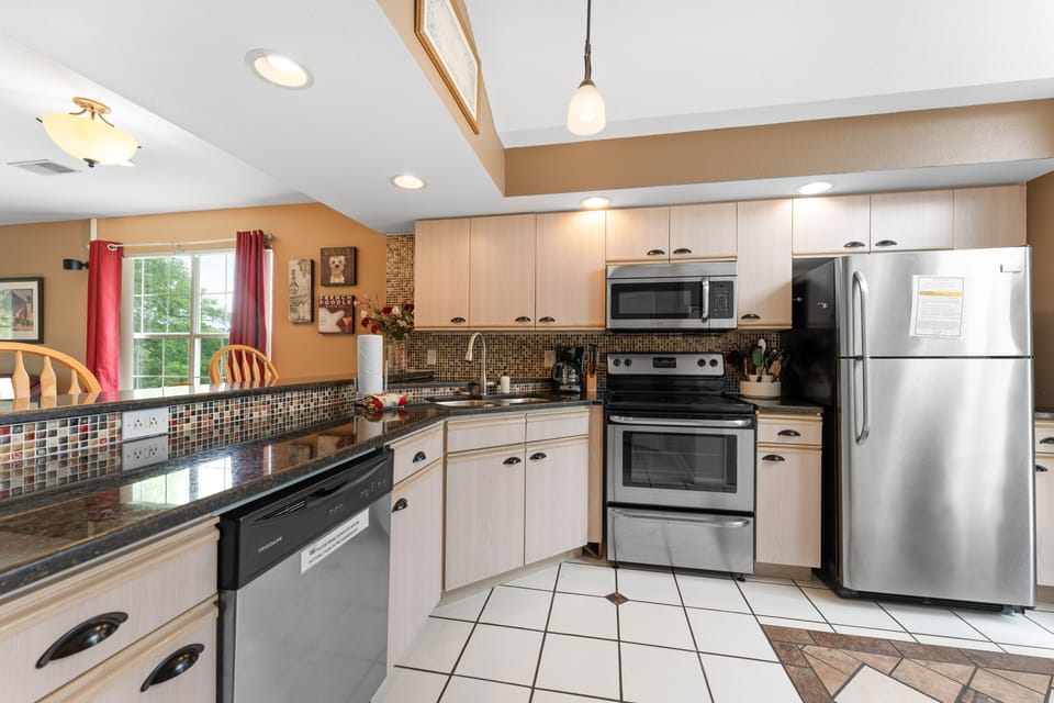 Condo, 2 Bedrooms | Private kitchen | Full-size fridge, microwave, oven, stovetop