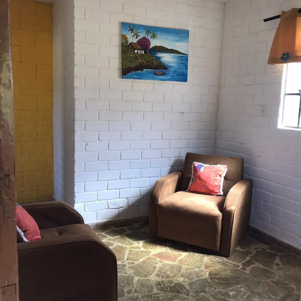 Standard Suite, 1 Bedroom, Lagoon View | Living room | 20-inch TV with satellite channels
