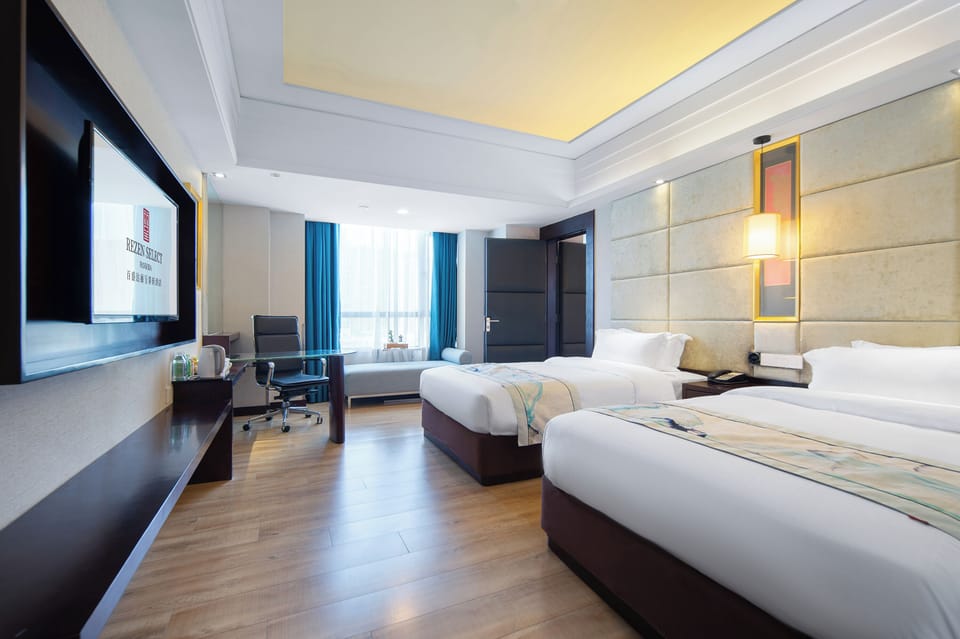 Family Suite, 2 Bedrooms, 2 Bathrooms | Memory foam beds, free minibar, in-room safe, blackout drapes