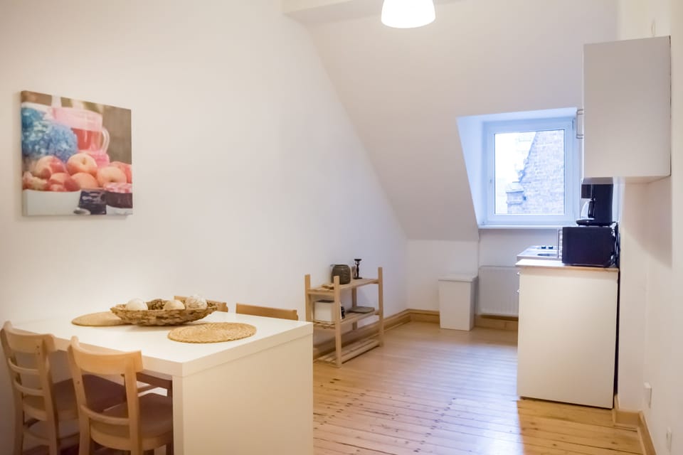 Basic Condo, 2 Bedrooms | Living area | Flat-screen TV