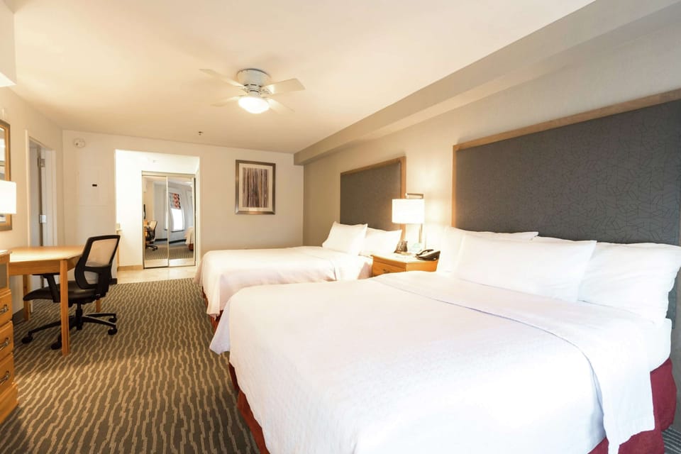 Suite, 2 Queen Beds, Non Smoking | Hypo-allergenic bedding, in-room safe, soundproofing, iron/ironing board