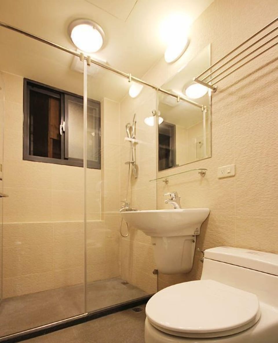 Standard Quadruple Room, 2 Double Beds (L) | Bathroom | Shower, free toiletries, hair dryer, slippers