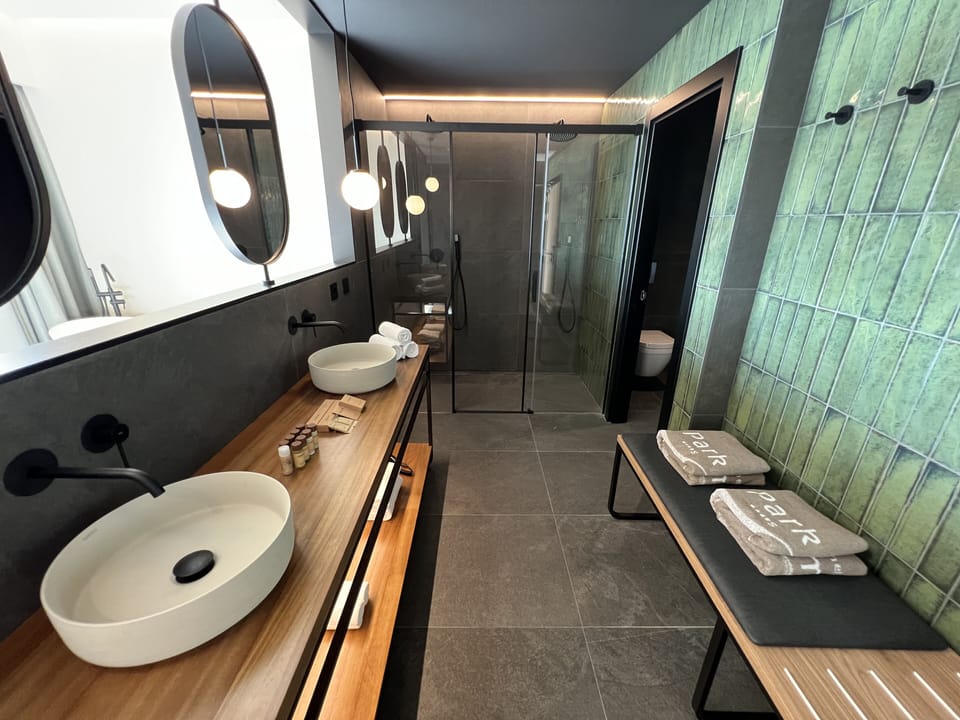 Hair dryer, towels, soap, shampoo
