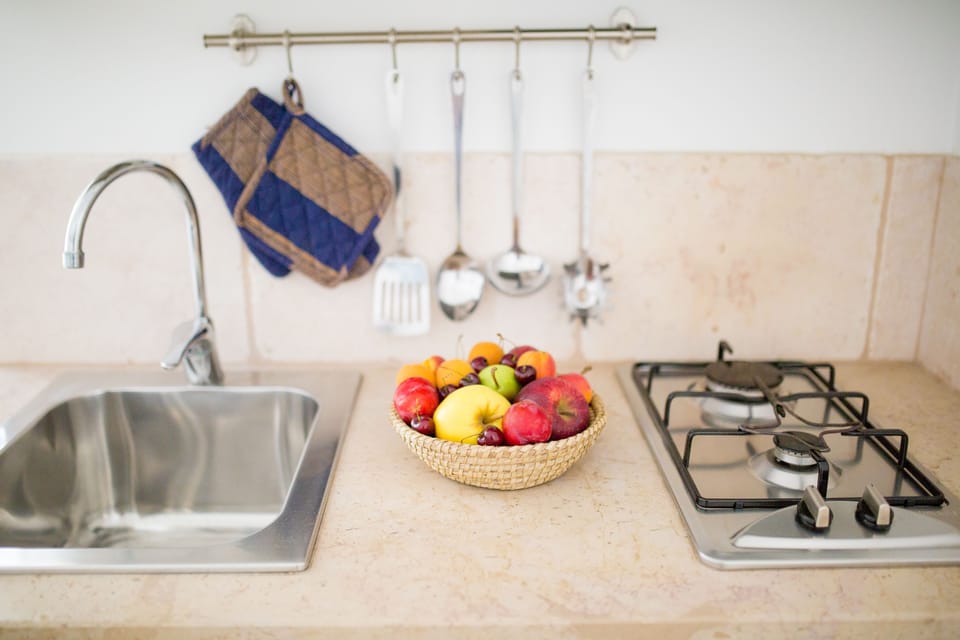 Apartment, 1 Bedroom | Private kitchenette | Fridge, stovetop, coffee/tea maker, electric kettle