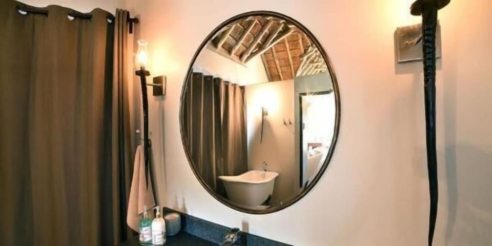 Separate tub and shower, deep soaking tub, hair dryer, bathrobes