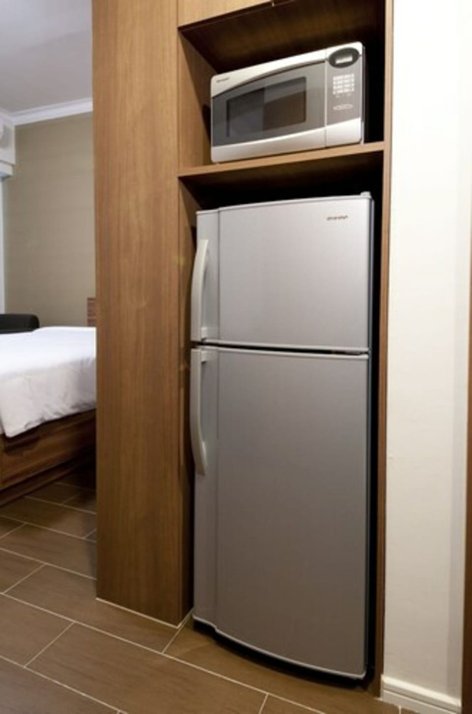 Deluxe Room | Private kitchen | Fridge, microwave, coffee/tea maker, electric kettle