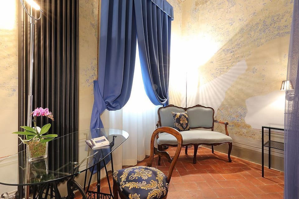 Triple Room, Stair Access Only | Living area | Flat-screen TV