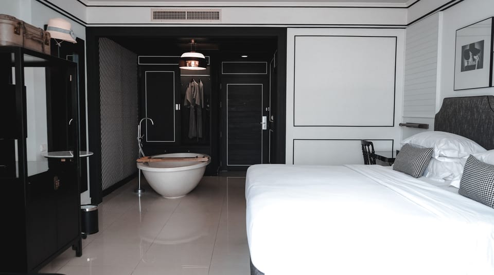 Chic Deluxe | In-room safe, individually decorated, desk, blackout drapes