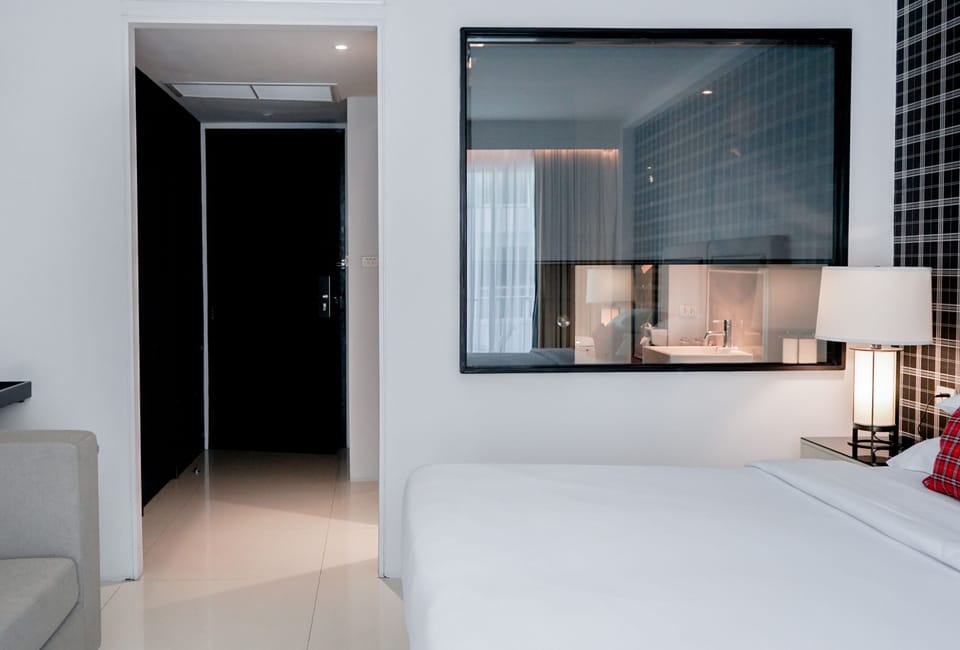 Deluxe Room | In-room safe, individually decorated, desk, blackout drapes