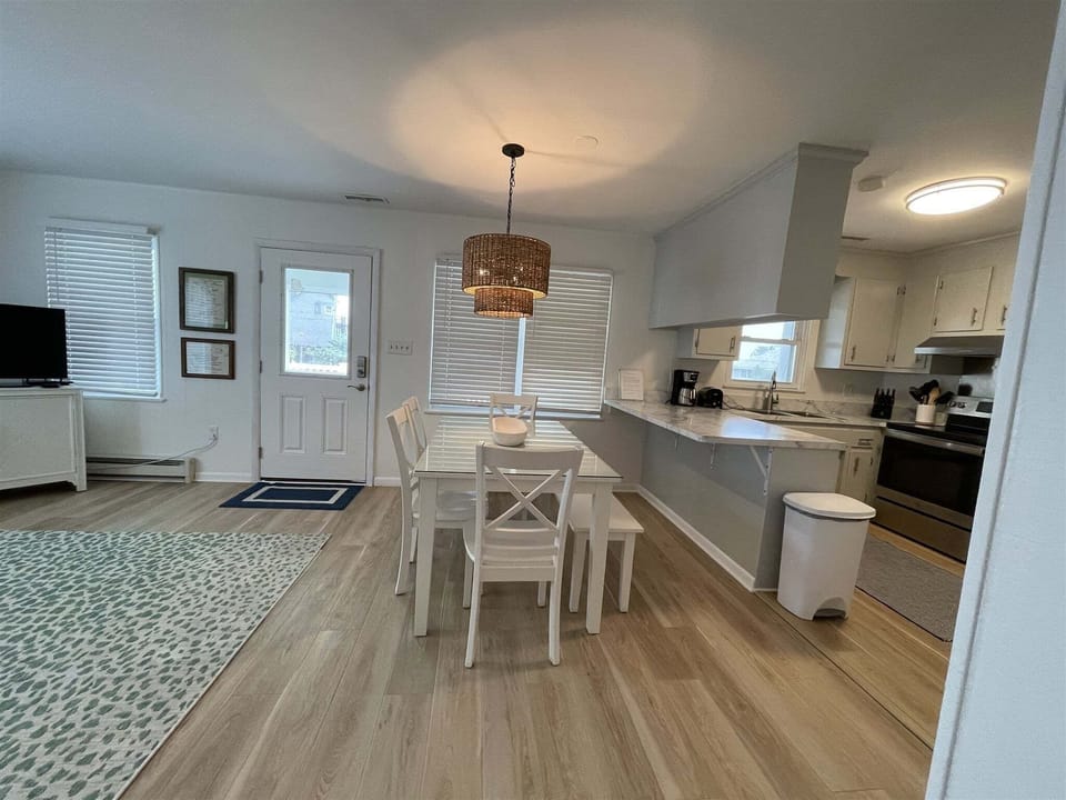 Cottage, 4 Bedrooms | Private kitchen | Coffee/tea maker, full-size fridge, microwave, stovetop