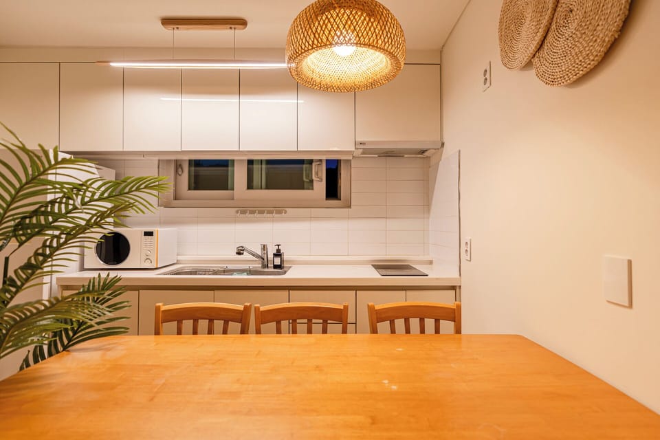 Family House, Multiple Beds, 2 Bathrooms, Garden View (45py Andante) | Private kitchen | Fridge, microwave, electric kettle, rice cooker