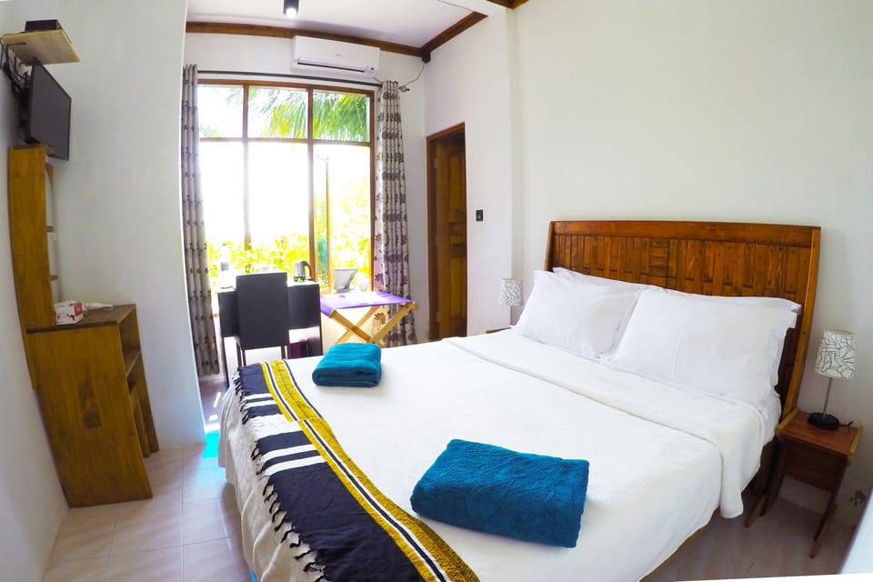 Double Room Beach Front Sea View | Premium bedding, in-room safe, desk, laptop workspace