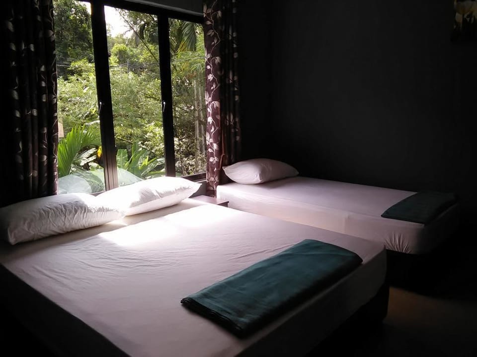 Triple Room, Private Bathroom (External) | Iron/ironing board, free WiFi, bed sheets