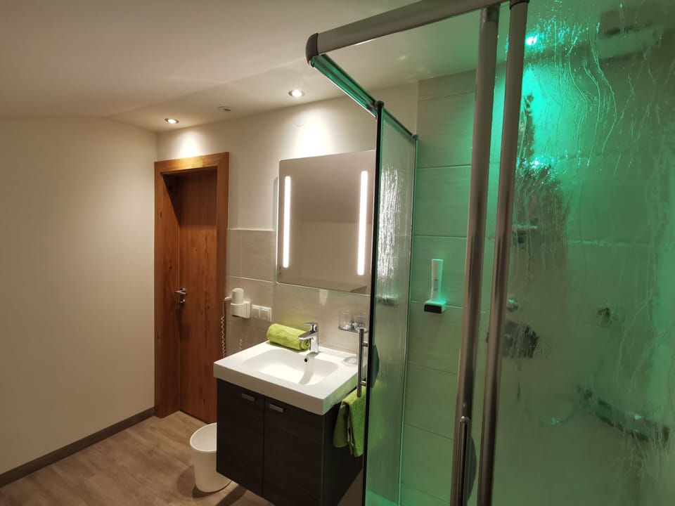 Quadruple Room, Balcony, Mountain View | Bathroom | Rainfall showerhead, hair dryer, towels