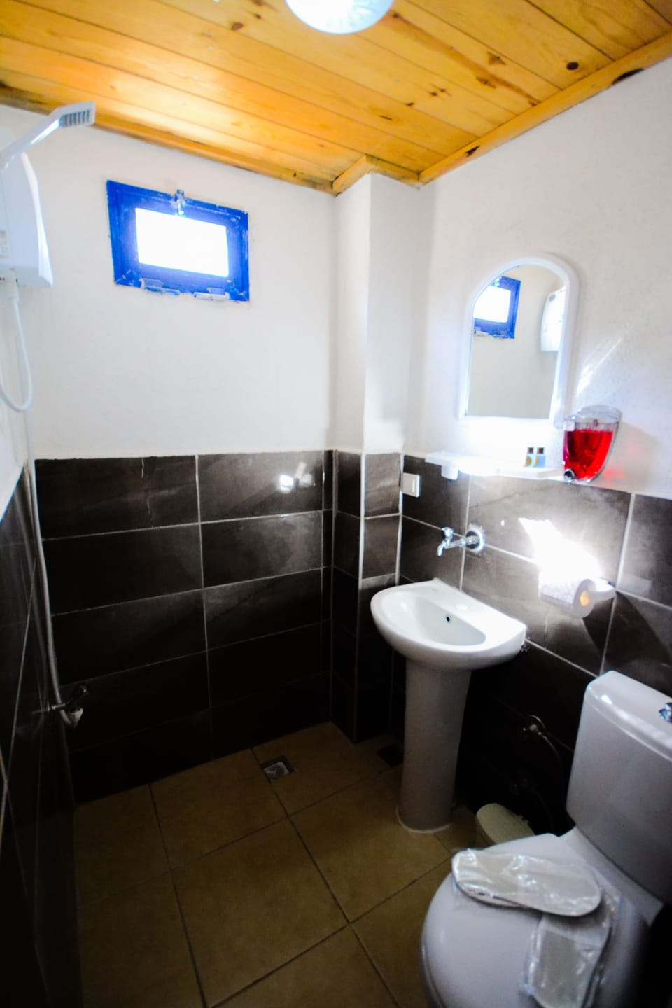 Standard Double Room | Bathroom | Shower, free toiletries, slippers, towels
