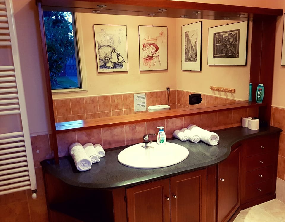 Comfort Quadruple Room, 2 Queen Beds, Private Bathroom, Garden View | Bathroom | Free toiletries, hair dryer, bathrobes, towels