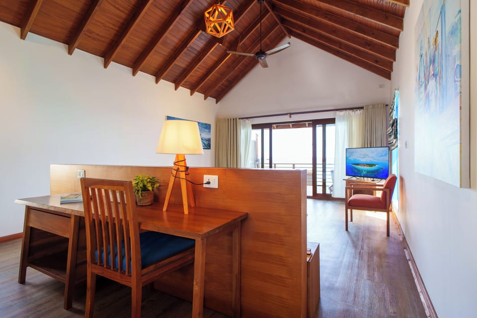Water Villa Sunset View | Down comforters, minibar, in-room safe, desk