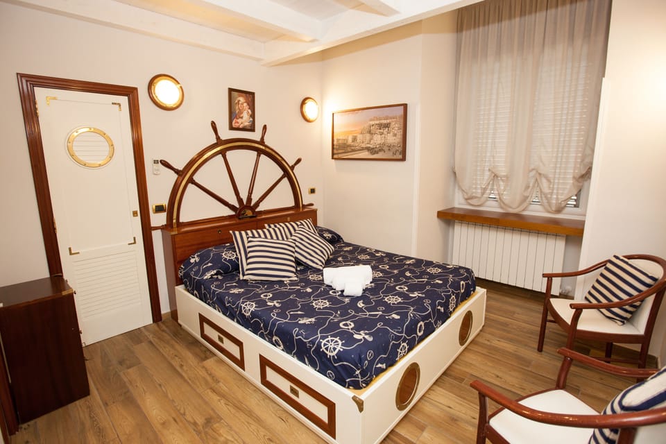 Premium bedding, desk, laptop workspace, free WiFi