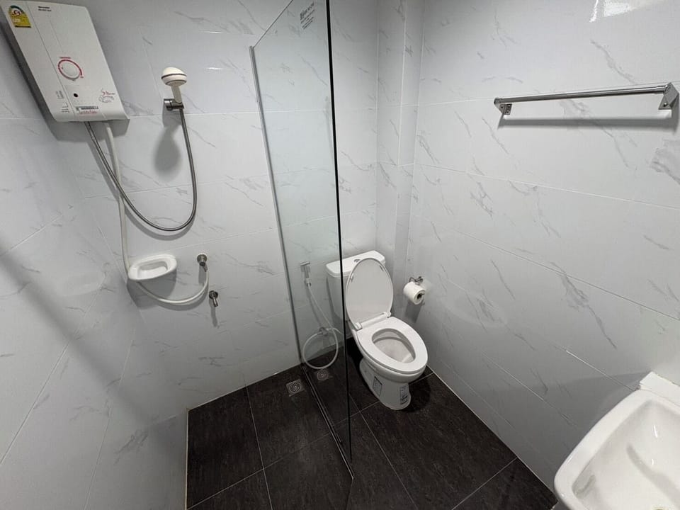 Shower, free toiletries, towels, soap